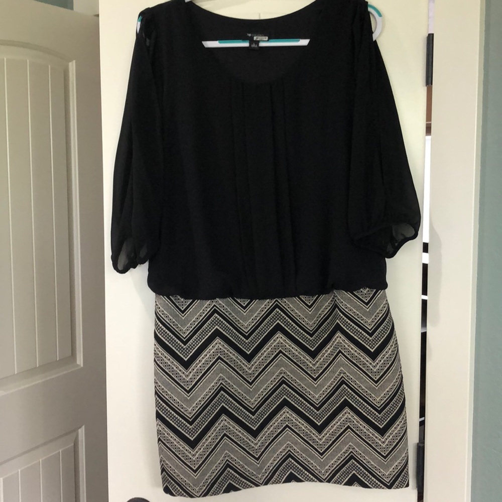 Large Dress with open arms.
